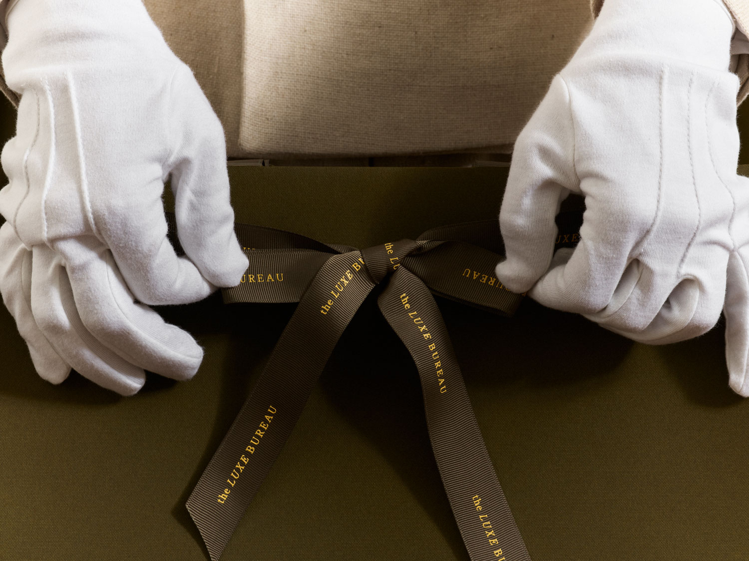 Luxury retail carrier bags, bespoke bubble print ribbon handle, sustainable materials, custom packaging production by Progress