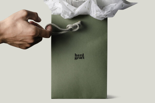 Branded paper bags with custom coloured paper finish, premium paper bags production by Progress