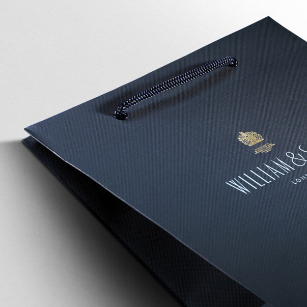 Custom colour matched branded luxury paper bags with deco gusset bottom, production by Progress