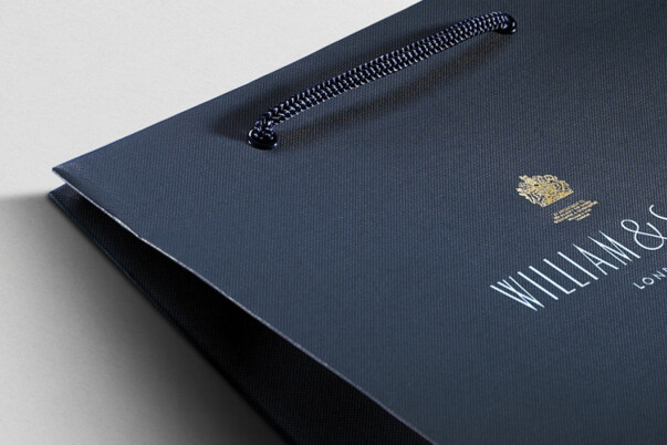 Custom colour matched branded luxury paper bags with deco gusset bottom, production by Progress